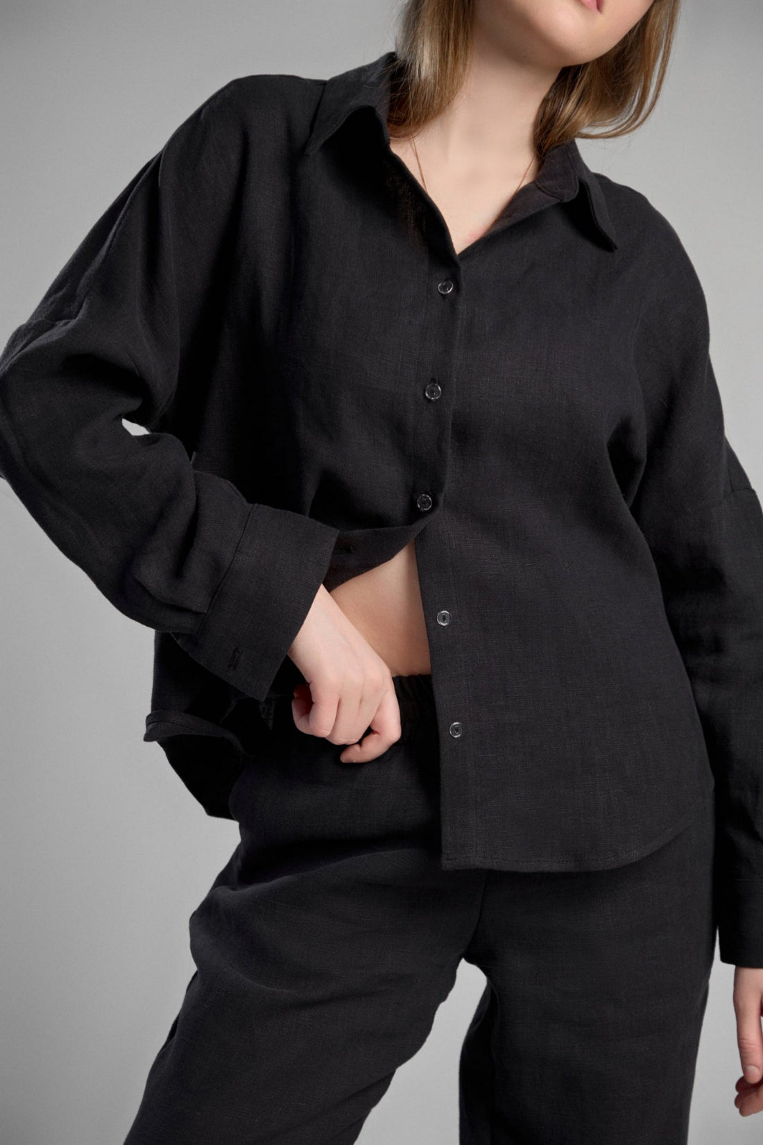 Women's black sustainable hemp set with straight leg pants and oversized shirt, perfect for all seasons and events.