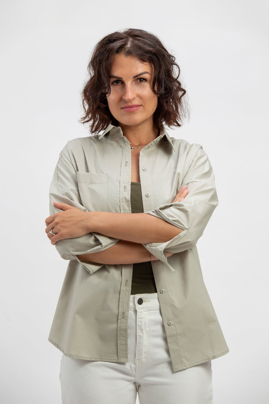 makö women's oversized sage green basic shirt, perfect for a classic and versatile wardrobe essential.