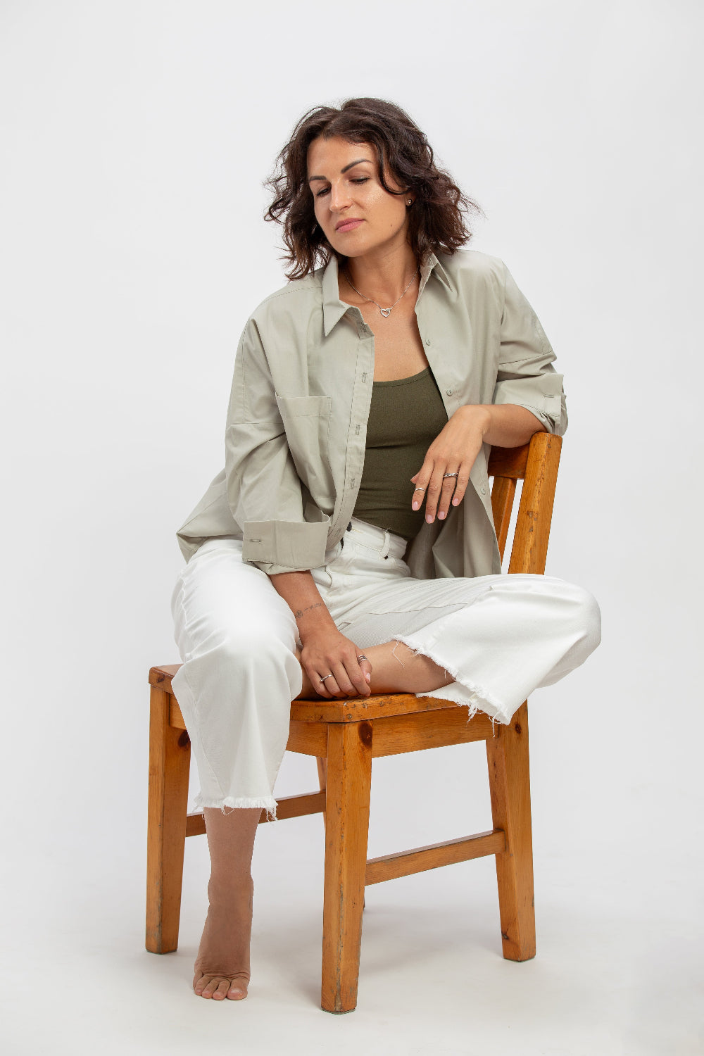 makö women's oversized sage green basic shirt, perfect for a classic and versatile wardrobe essential.