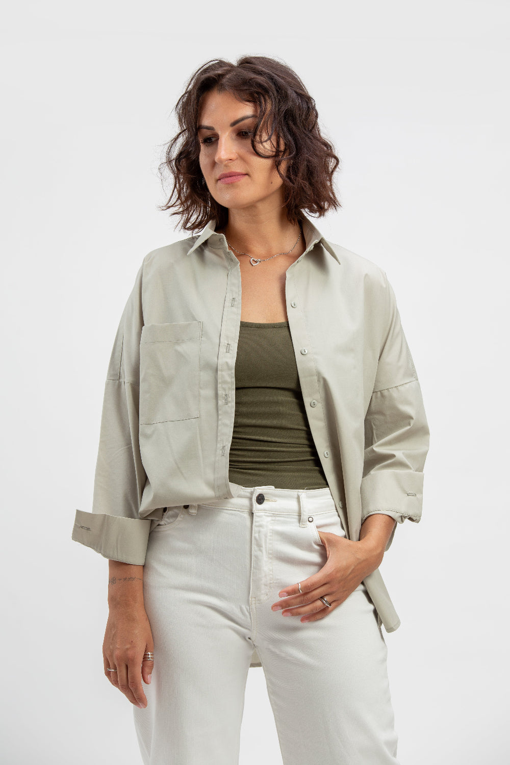 makö women's oversized sage green basic shirt, perfect for a classic and versatile wardrobe essential.