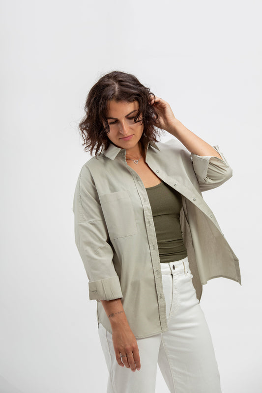 makö women's oversized sage green basic shirt, perfect for a classic and versatile wardrobe essential.