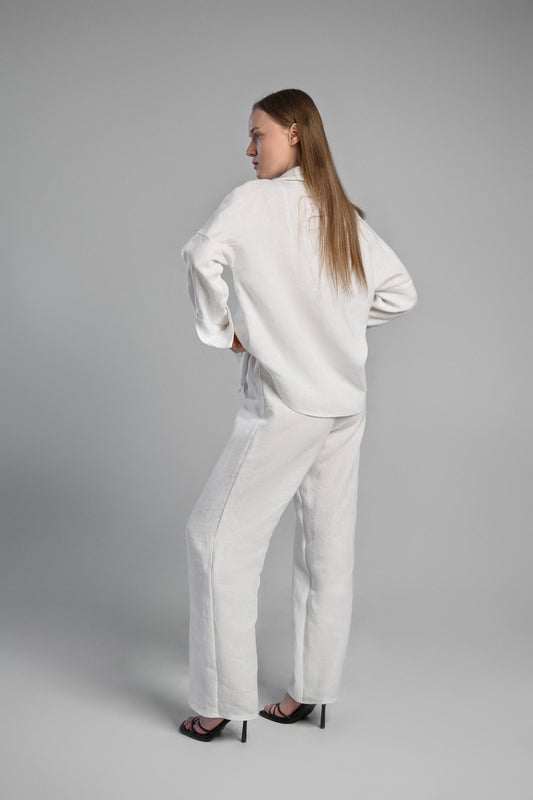 Women's white sustainable hemp set with straight leg pants and oversized shirt. Perfect for all seasons and events.