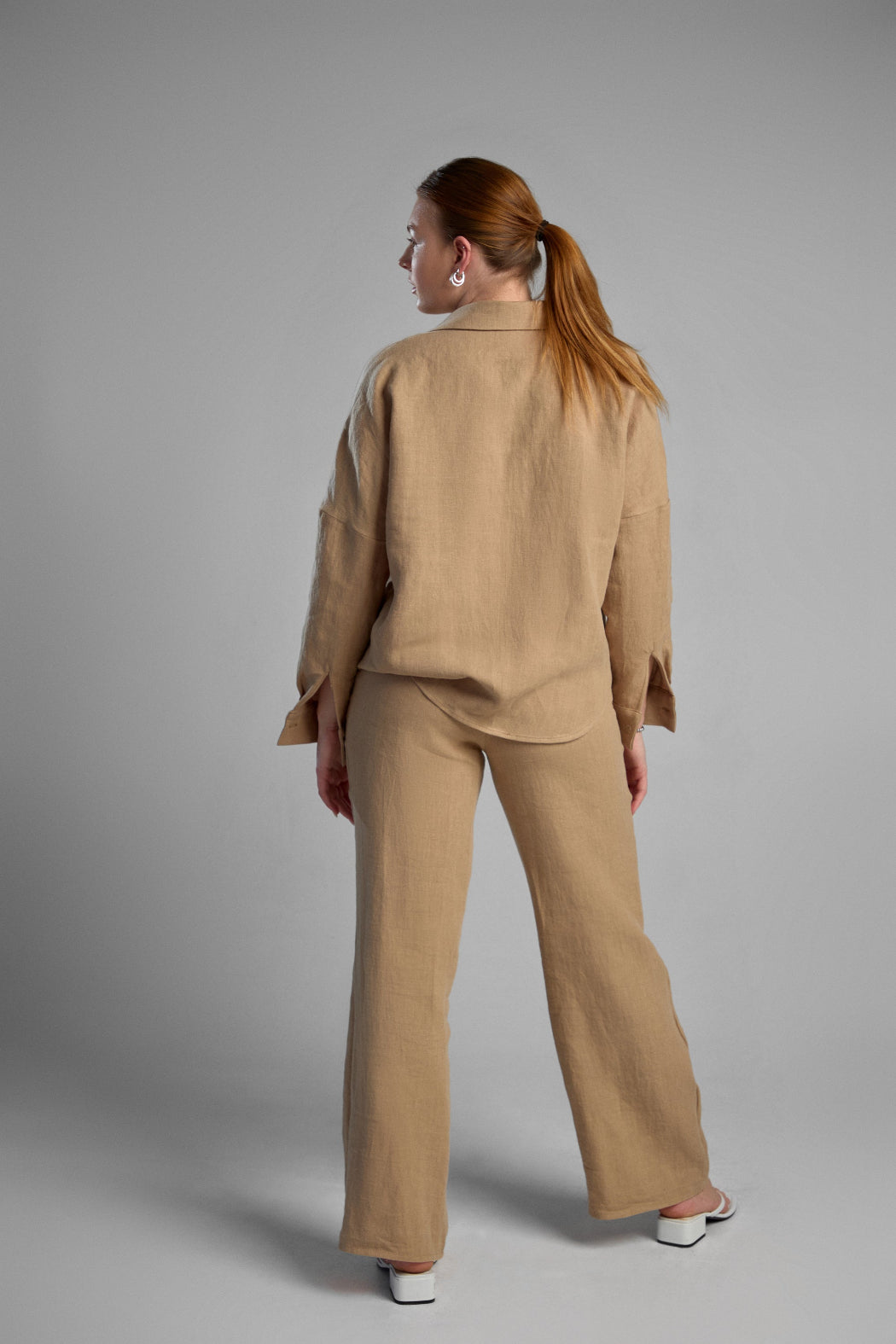 Women's sustainable hemp set with straight leg pants and oversized shirt in color latte. Perfect for all seasons and events.