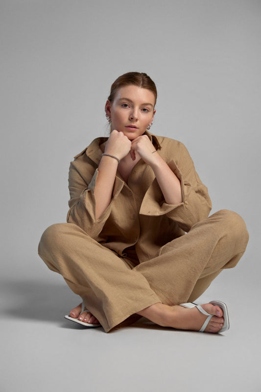 Women's sustainable hemp set with straight leg pants and oversized shirt in color latte. Perfect for all seasons and events.