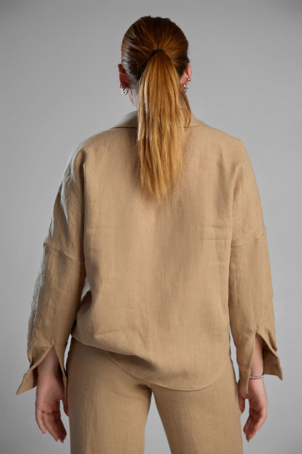 Women's sustainable hemp set with straight leg pants and oversized shirt in color latte. Perfect for all seasons and events.