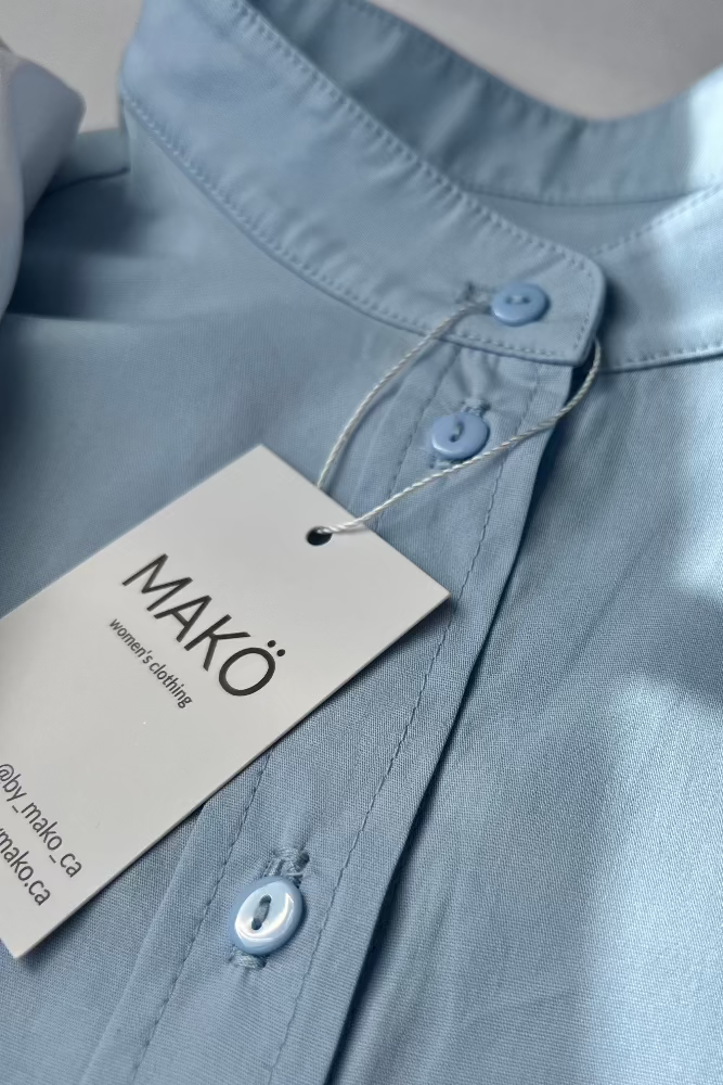 makö women's oversized short blue basic shirt, perfect for a classic and versatile wardrobe essential.