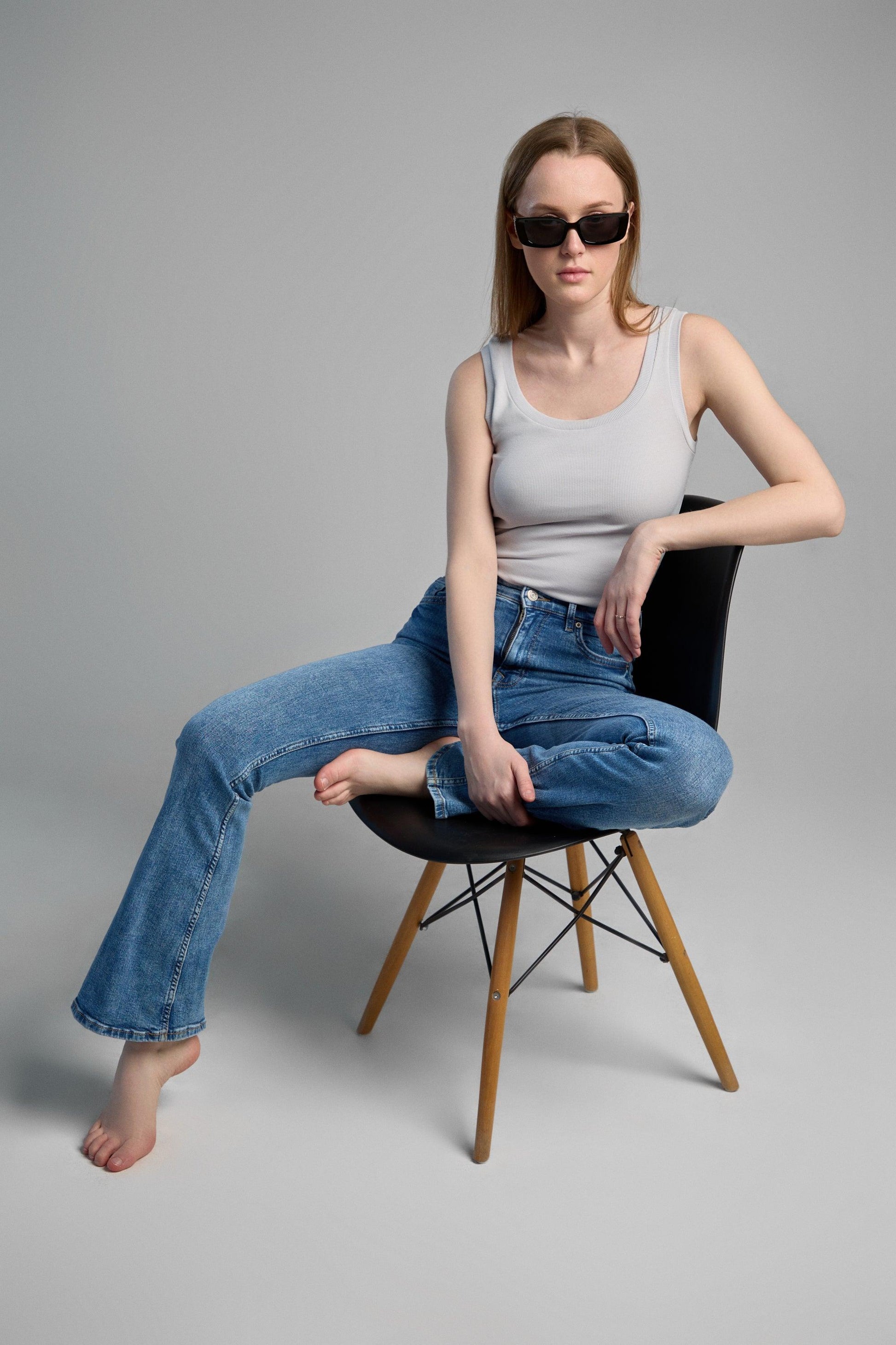 a stylish, grey tank top made from makö recycled cotton, emphasizing eco-friendly materials and comfortable fit.