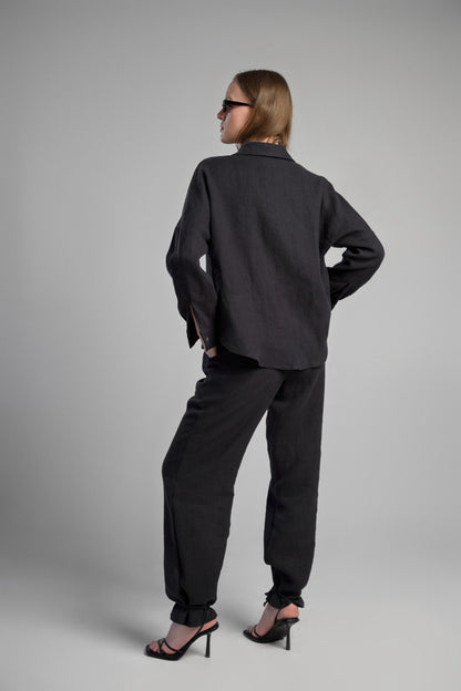 Women's black sustainable hemp set with straight leg pants and oversized shirt, perfect for all seasons and events.