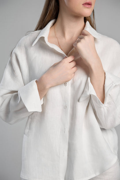 Women's white sustainable hemp set with straight leg pants and oversized shirt. Perfect for all seasons and events.