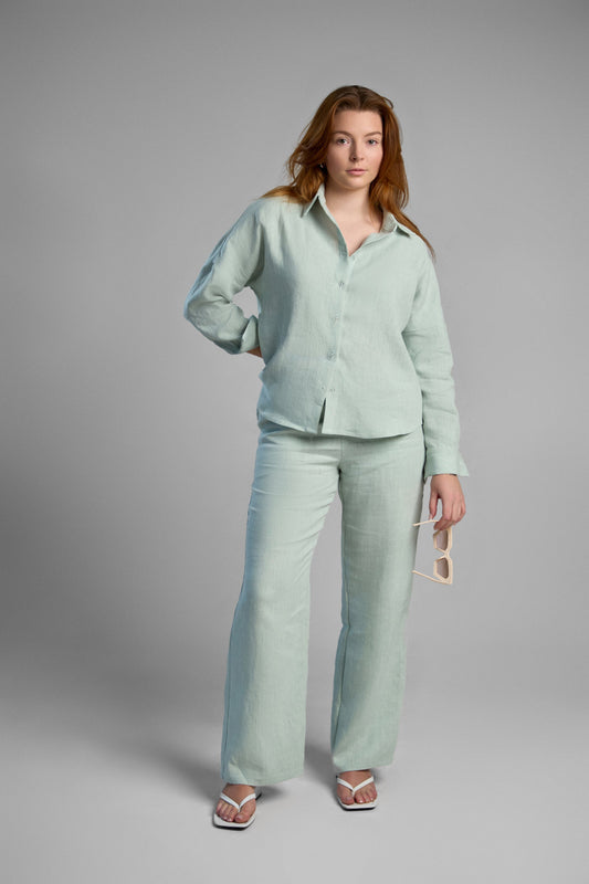 Women's light green sustainable hemp set with straight leg pants and oversized shirt, perfect for all seasons and events.